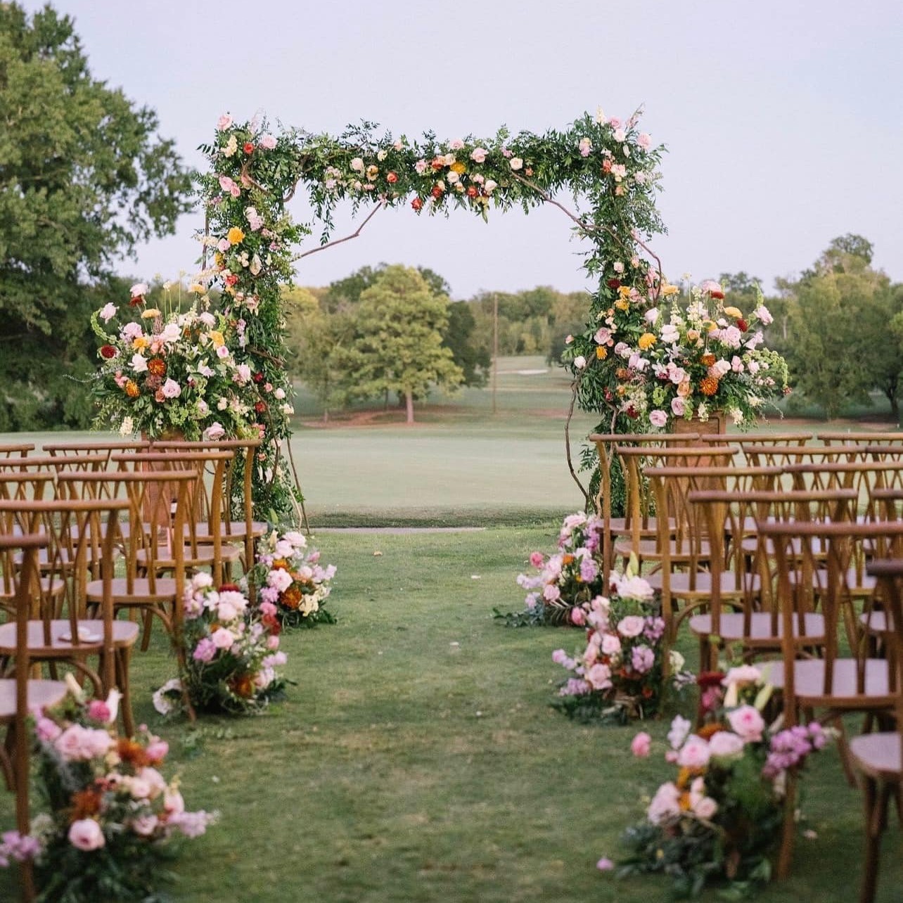 Gold chiavari chair rentals around reception tables, Party Central
