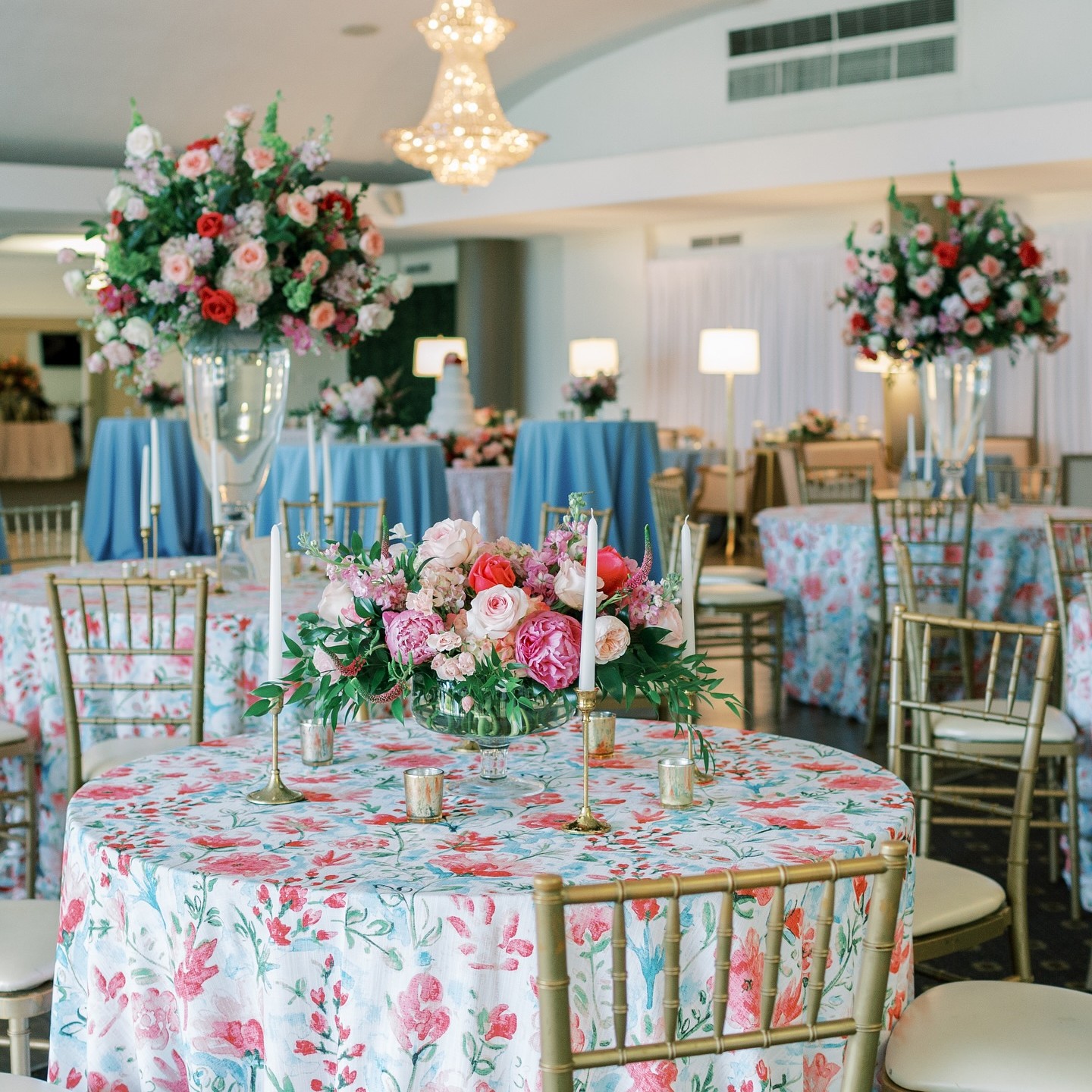 Marbled cream linen rental on a reception table with crossback chairs, Party Central